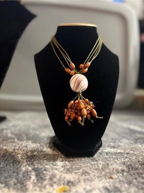 Pink Swirl Pendant Necklace with Amber Bead Tassel